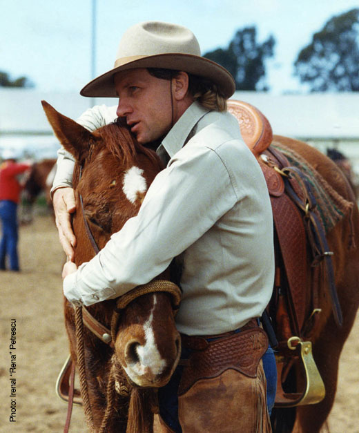 Buck hugs his horses head